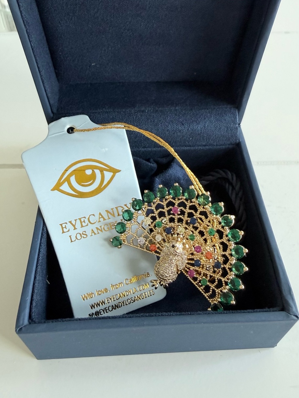Eye Candy Gold-Plated Peacock Fan Ring with Green Gem Accents